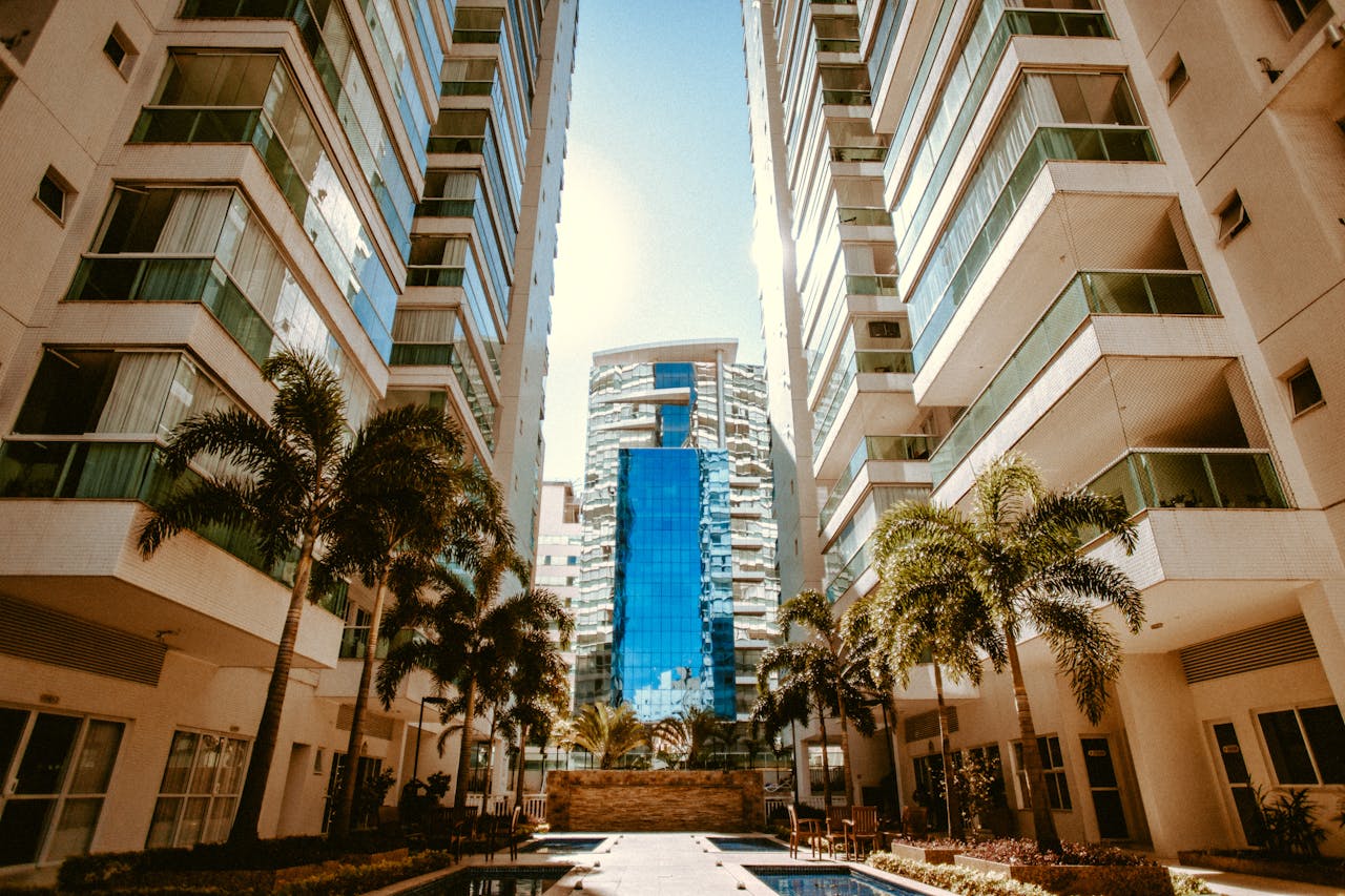 Crafting Captivating Headlines: Your awesome post title goes here View of modern urban skyscrapers with palm trees, showcasing contemporary architecture.
